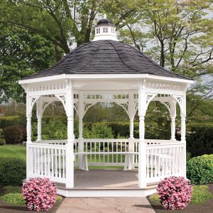 Octagon white vinyl bell roof gazebo with a built in bench, gray roofing, and white cupola.