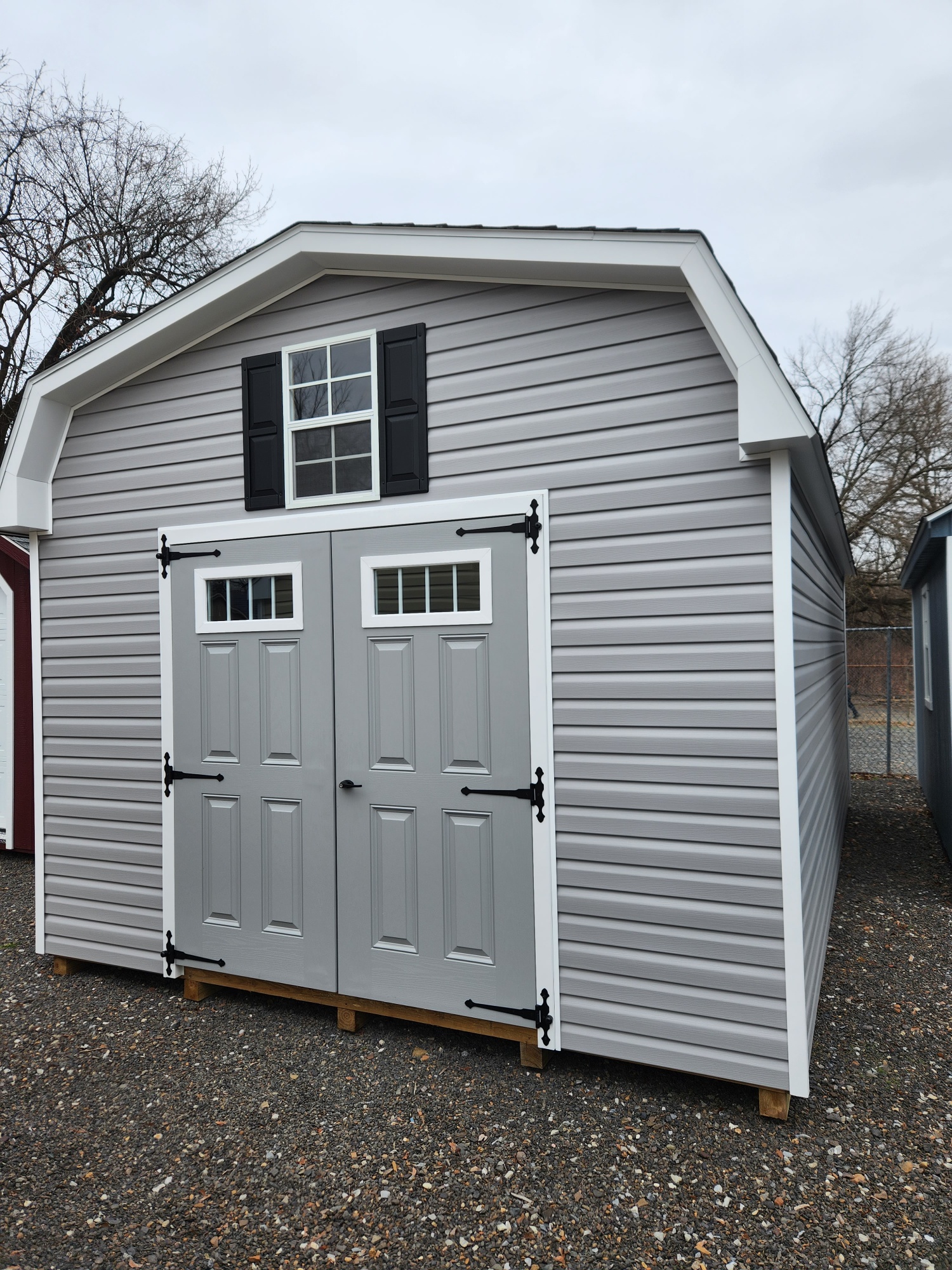 12 x 20 Vinyl Dutch Barn with lofts and work bench Stock# 45-22 $8953.00