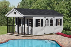 Porch Shed with white vinyl siding, black porch rails and posts, 3 windows with black shutters, a single door with an arched window, double doors with arched windows, and back asphalt roofing.