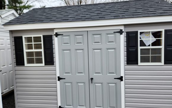 Stock#20-24 8×12 Cape roof, 2 painted doors in slate,  1) 42"x8' loft  $4107.00