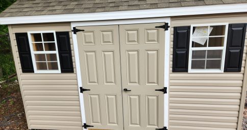 Stock#40-23 8x12 Vinyl Cape 2) painted doors,  1) 42"×8 loft $4107.00
