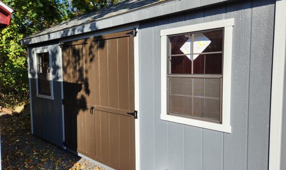 Stock#50-24 8×16 7' Cape Ebony doors,  2) 4x8 lofts,  wood corners,  2 larger windows,  5036.00