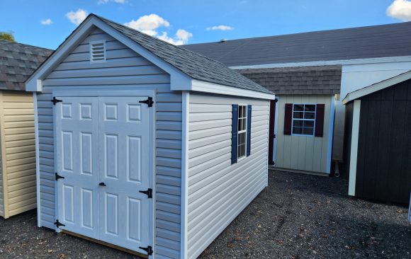 Stock#48-24 8×11 vinyl Cape w white doors, 1 4x8 loft, $4057.00